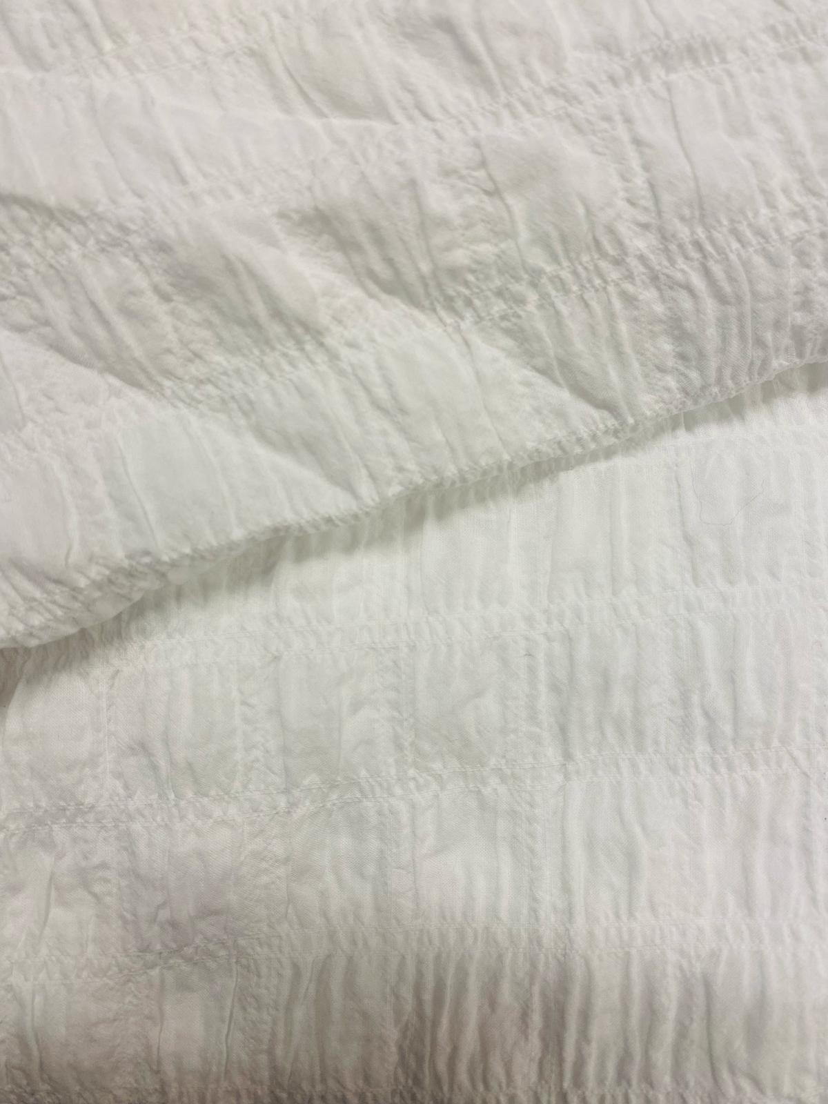 Gros plan qualité tissu - Autour du Tissu